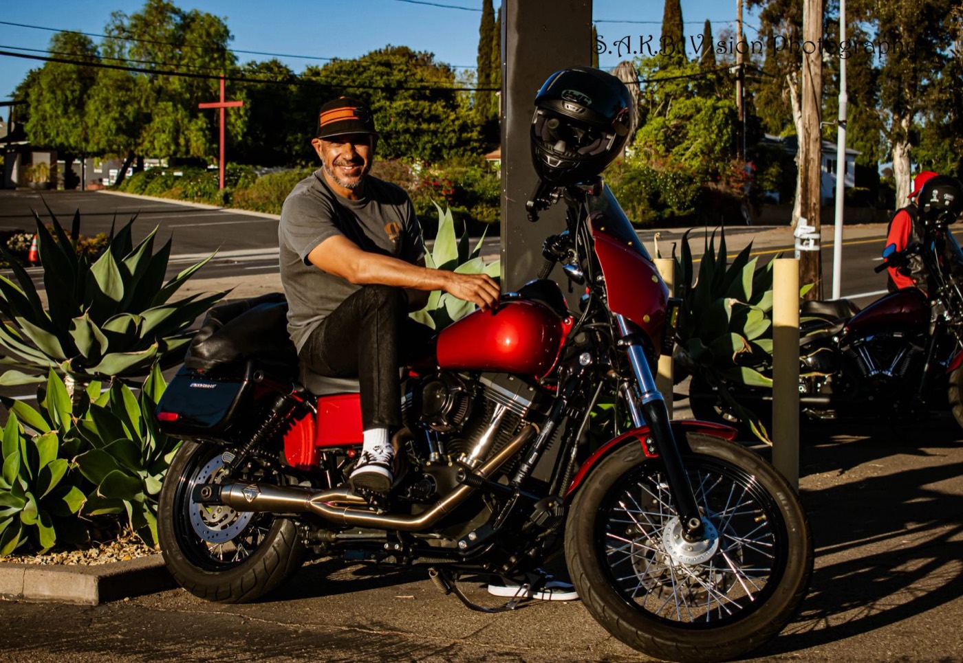 Rider on a red Harley-Davidson at an El Cajon dealership event